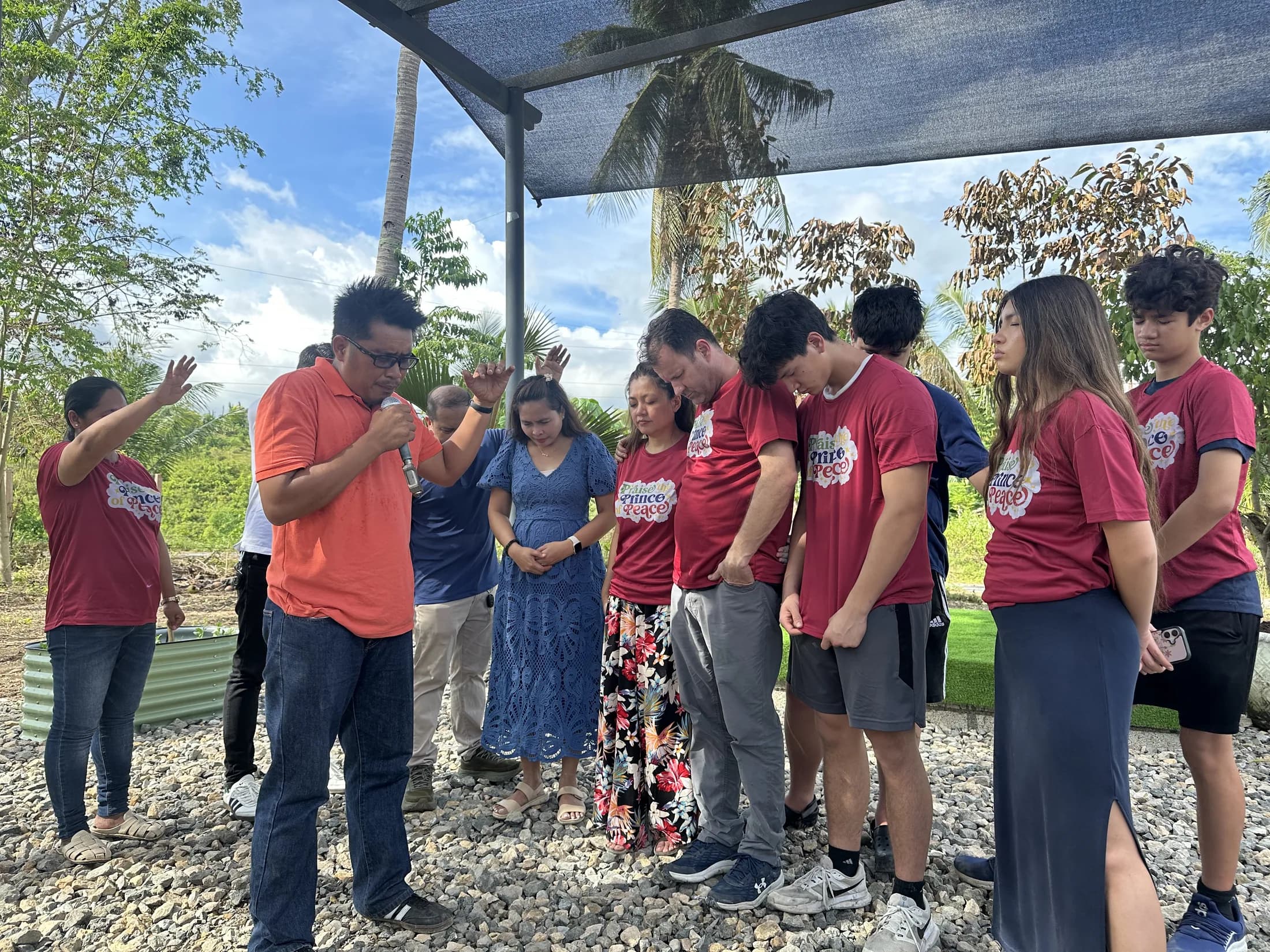 Community members standing together outdoors